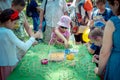 Children Ã¢â¬â boys and girls - and their parents participating at art and craft outdoors workshop